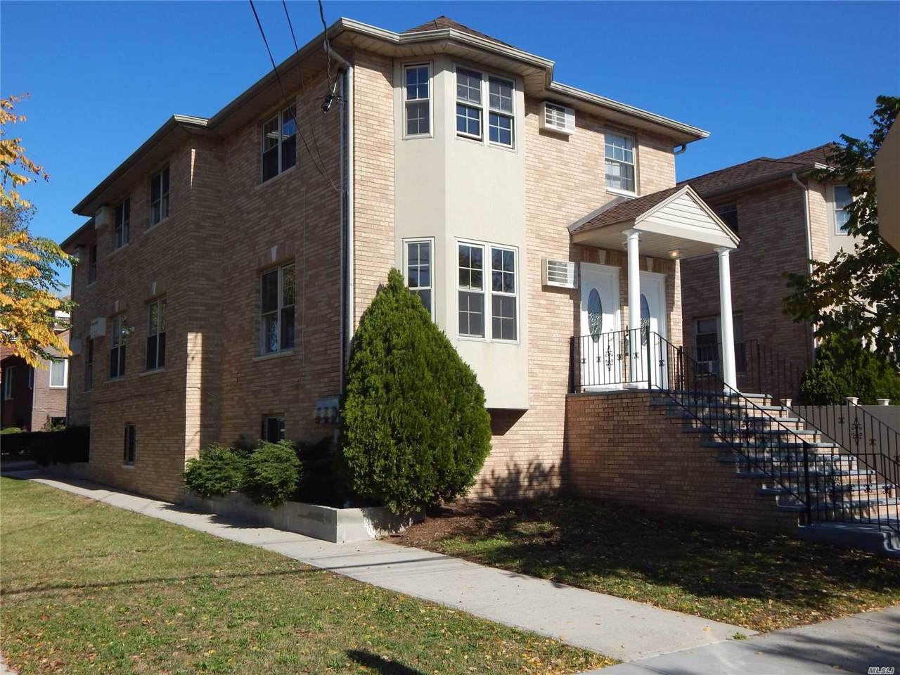 207-03 42nd Ave - Photo 1