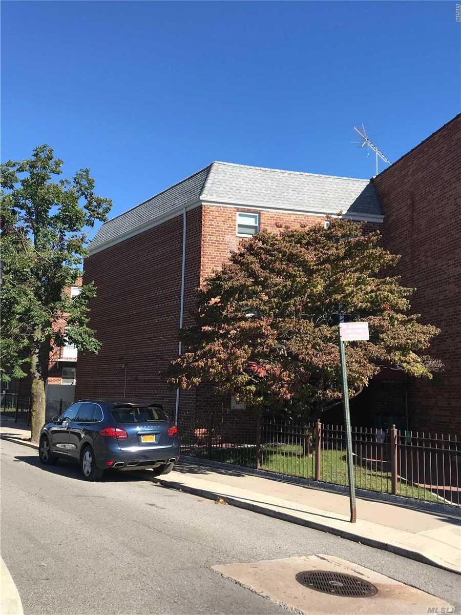 77-03 74 St - Photo 1