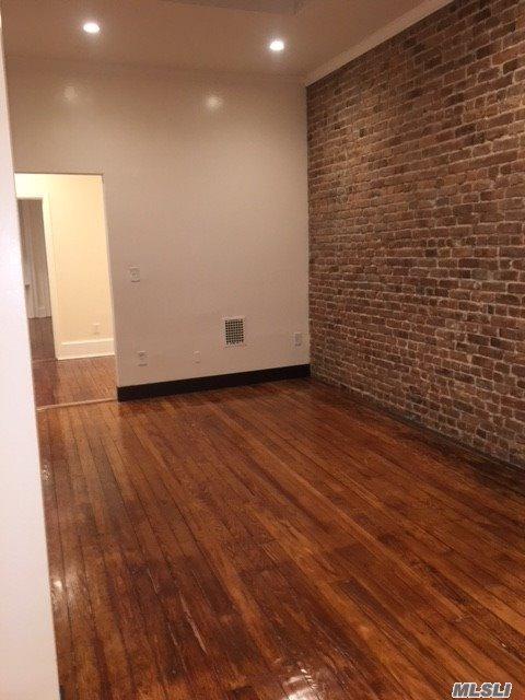 71-30 67 St - Photo 1