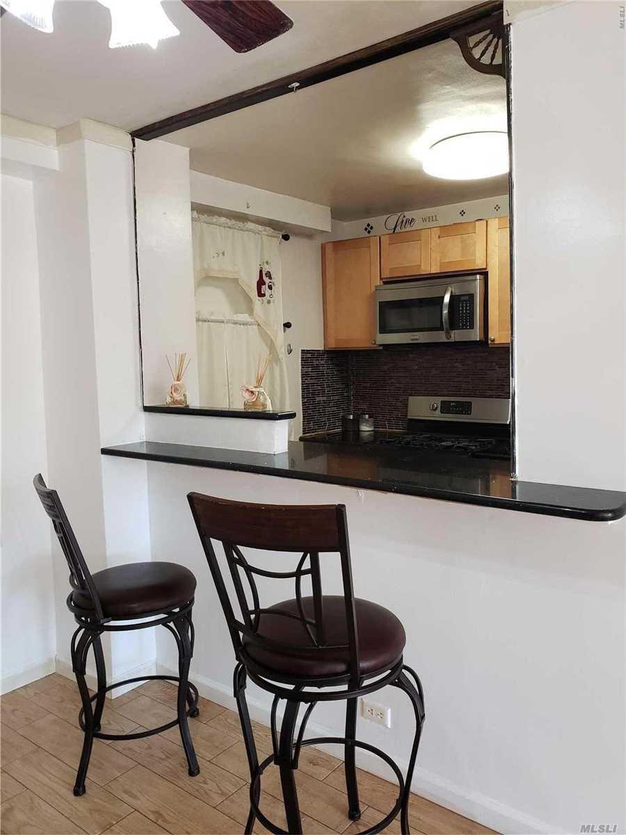 61-15 97th St - Photo 1