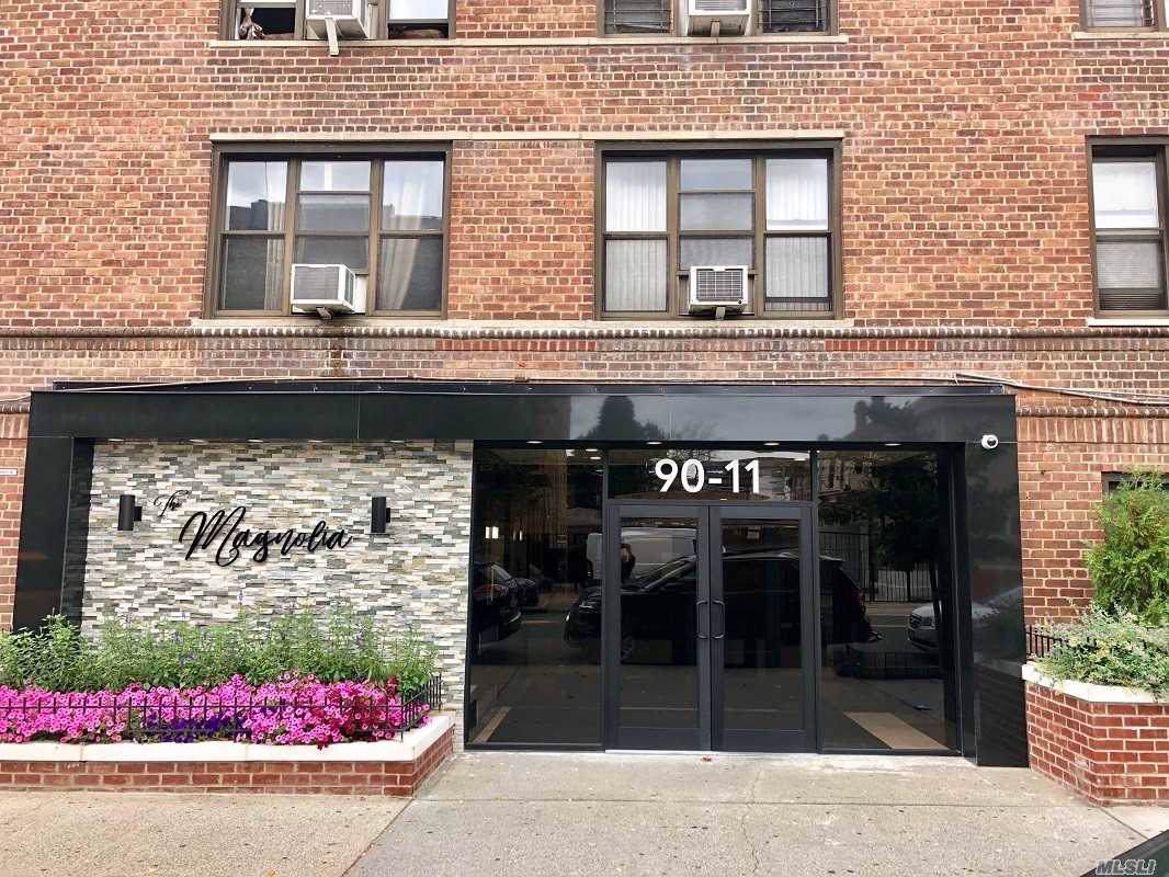90-11 35th Ave - Photo 1