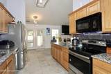 9509 Hunters Trail Ct - Photo 13