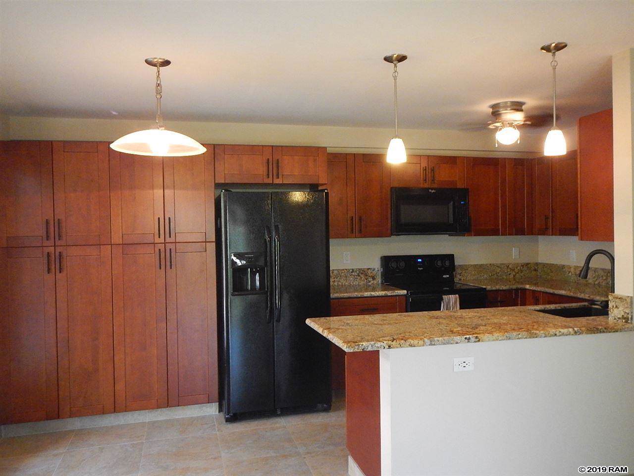 140 Uwapo Rd - Photo 1