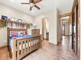 9753 Falcon Roost Point - Photo 38