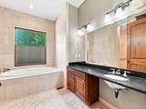 9753 Falcon Roost Point - Photo 48