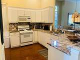 7711 Whitebridge Glen - Photo 4