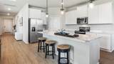 10425 Woodland Garden Way - Photo 4