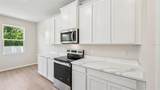 10437 Woodland Garden Way - Photo 5