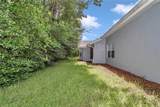 8011 115TH LOOP - Photo 40