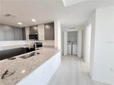 5587 Millenia Park Blvd, Unit 221 - Photo 4