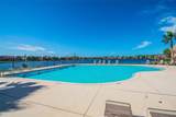 9740 Lake Chase Island Way - Photo 28
