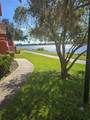 9228 Lake Chase Island Way - Photo 20