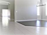 4635 Whispering Wind Avenue - Photo 5