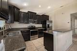 12116 Echo Basin Cove - Photo 15