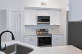9818 Lake Chase Island Way - Photo 21