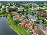 9818 Lake Chase Island Way - Photo 34