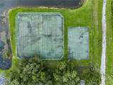9818 Lake Chase Island Way - Photo 37