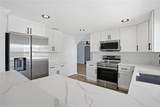 9837 Island Harbor Drive - Photo 13