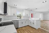 9837 Island Harbor Drive - Photo 16