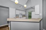 9078 Lake Chase Island Way - Photo 25