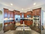 8640 Warwick Shore Crossing - Photo 16