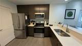 14501 Grove Resort Avenue - Photo 10