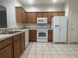 9806 Fan Palm Way - Photo 5