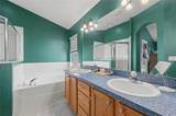 4756 Whispering Wind Avenue - Photo 30