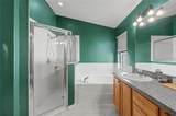4756 Whispering Wind Avenue - Photo 32
