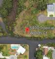 5400 Tropical Woods Court - Photo 1