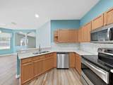 6077 Sandhill Ridge Drive - Photo 10
