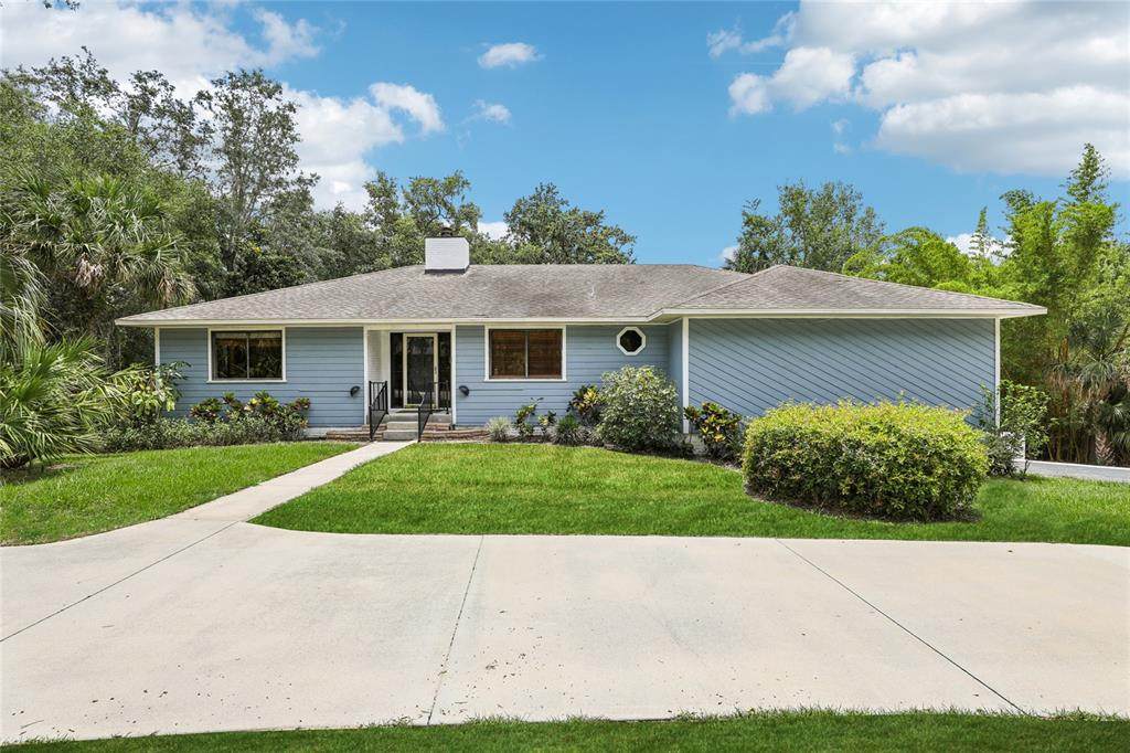 5836 Spruce Creek Woods Drive - Photo 1