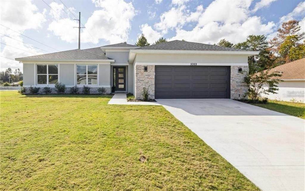8703 SW 135TH PL - Photo 1