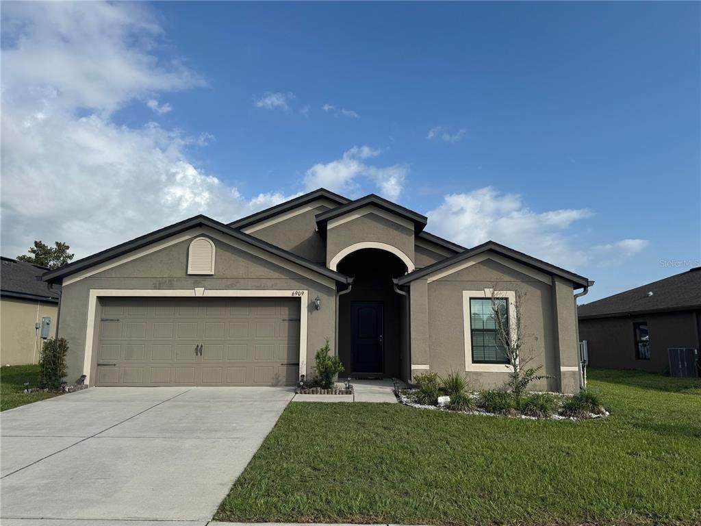 6909 Crested Orchid Drive - Photo 1