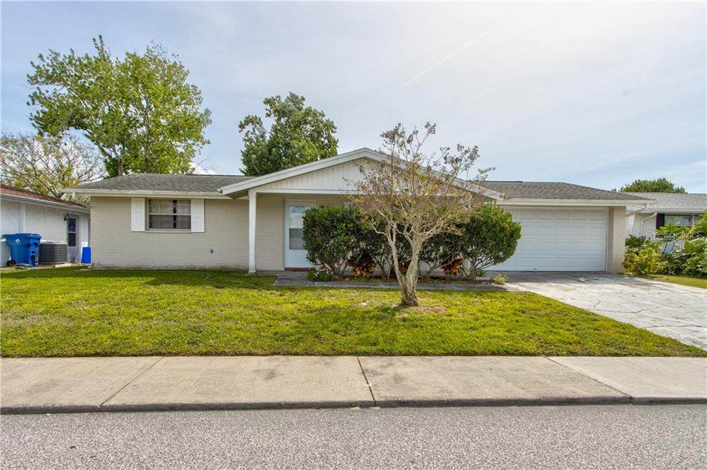 7000 Maplehurst Drive - Photo 1