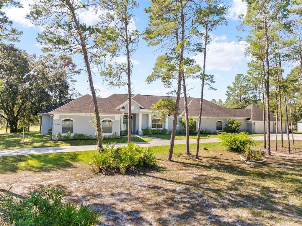11200 Woodland Waters Boulevard - Photo 1