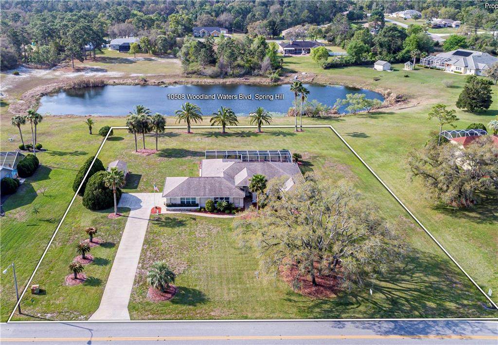 10508 Woodland Waters Boulevard - Photo 1