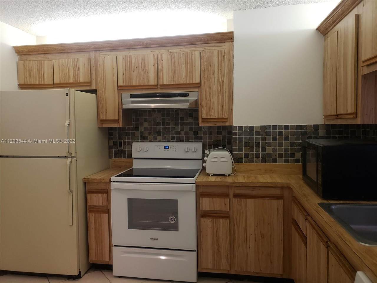 3650 95th Ter - Photo 1