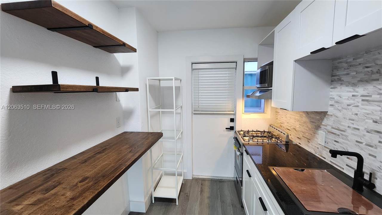 300 74th St - Photo 1