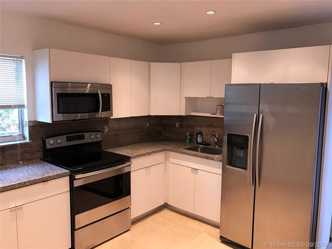 335 112th St - Photo 1
