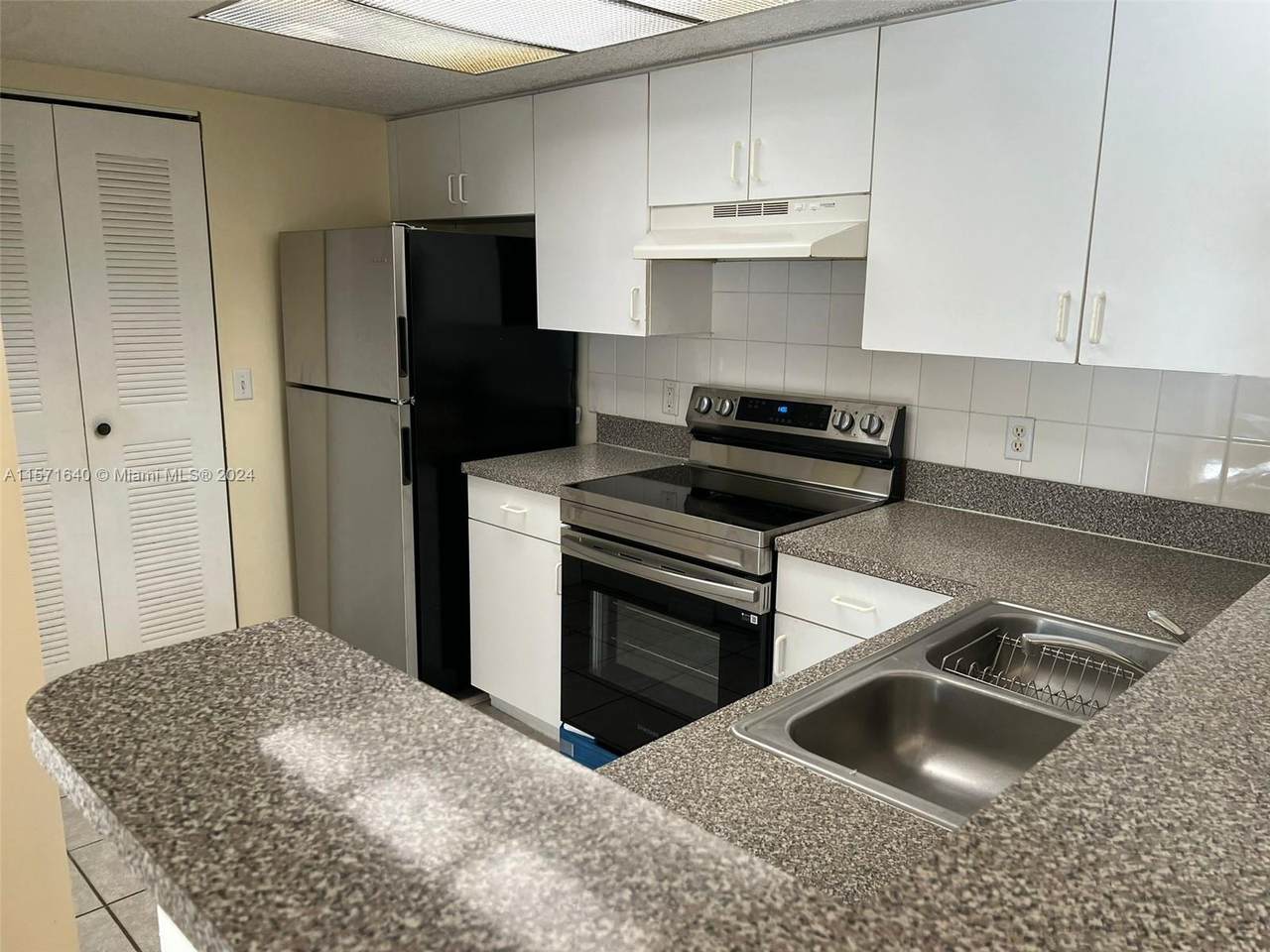 5021 Wiles Rd - Photo 1