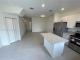883 211th St - Photo 4