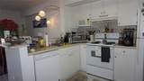 5077 7TH. ST - Photo 8