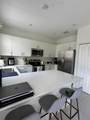 909 211th St - Photo 3