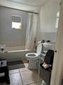1487 100th St - Photo 4