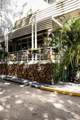 XXX Brickell - Photo 1