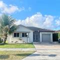 13438 SW 291st ST 291 - Photo 1