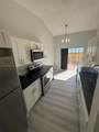 990 212th Ter - Photo 4