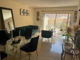 9491 Palm Cir N - Photo 12