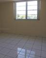 1465 123rd St - Photo 4